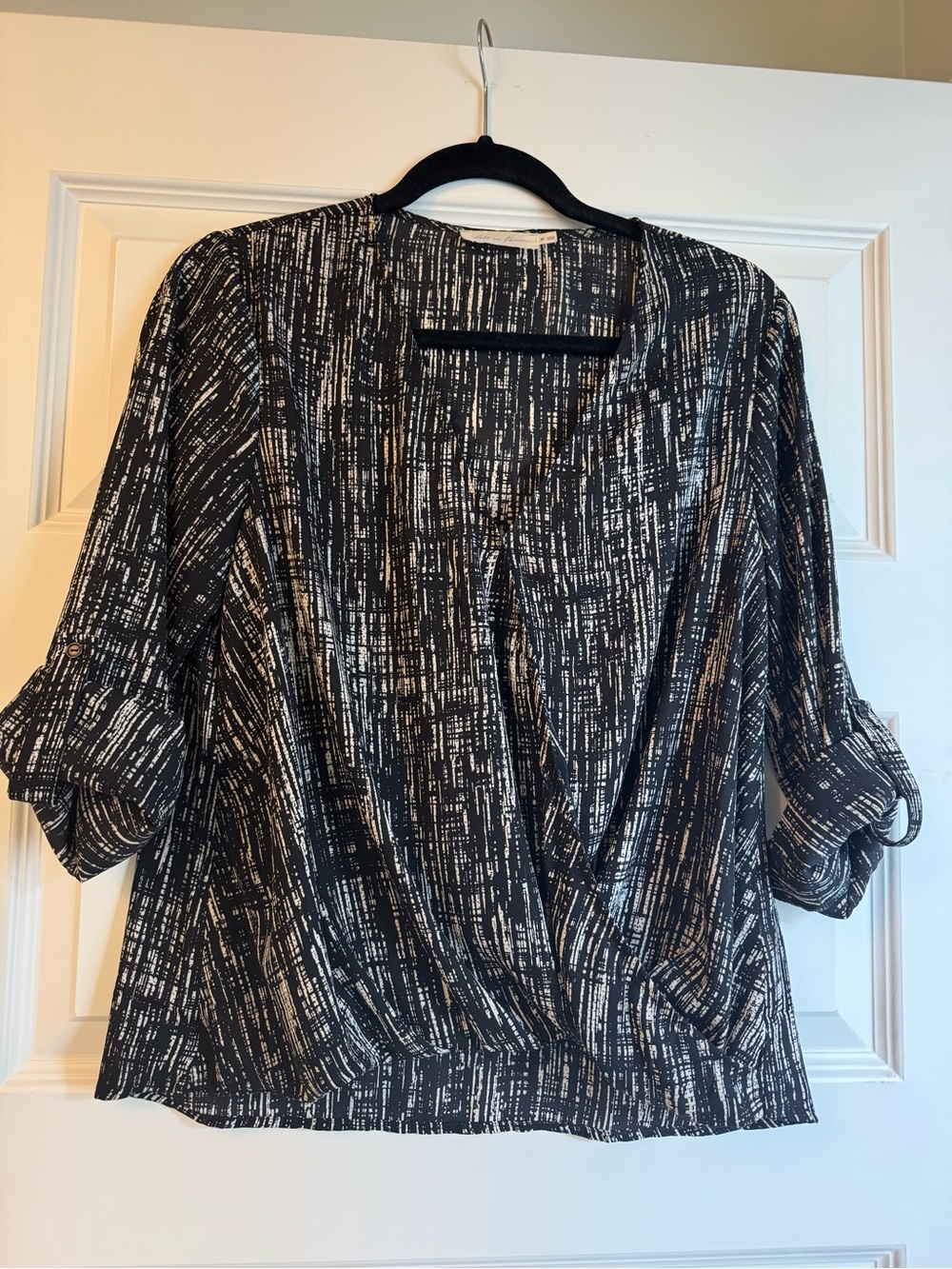 All in Favor Black & White Abstract Surplice Blouse